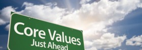 Core Values Just Ahead Green Road Sign and Clouds