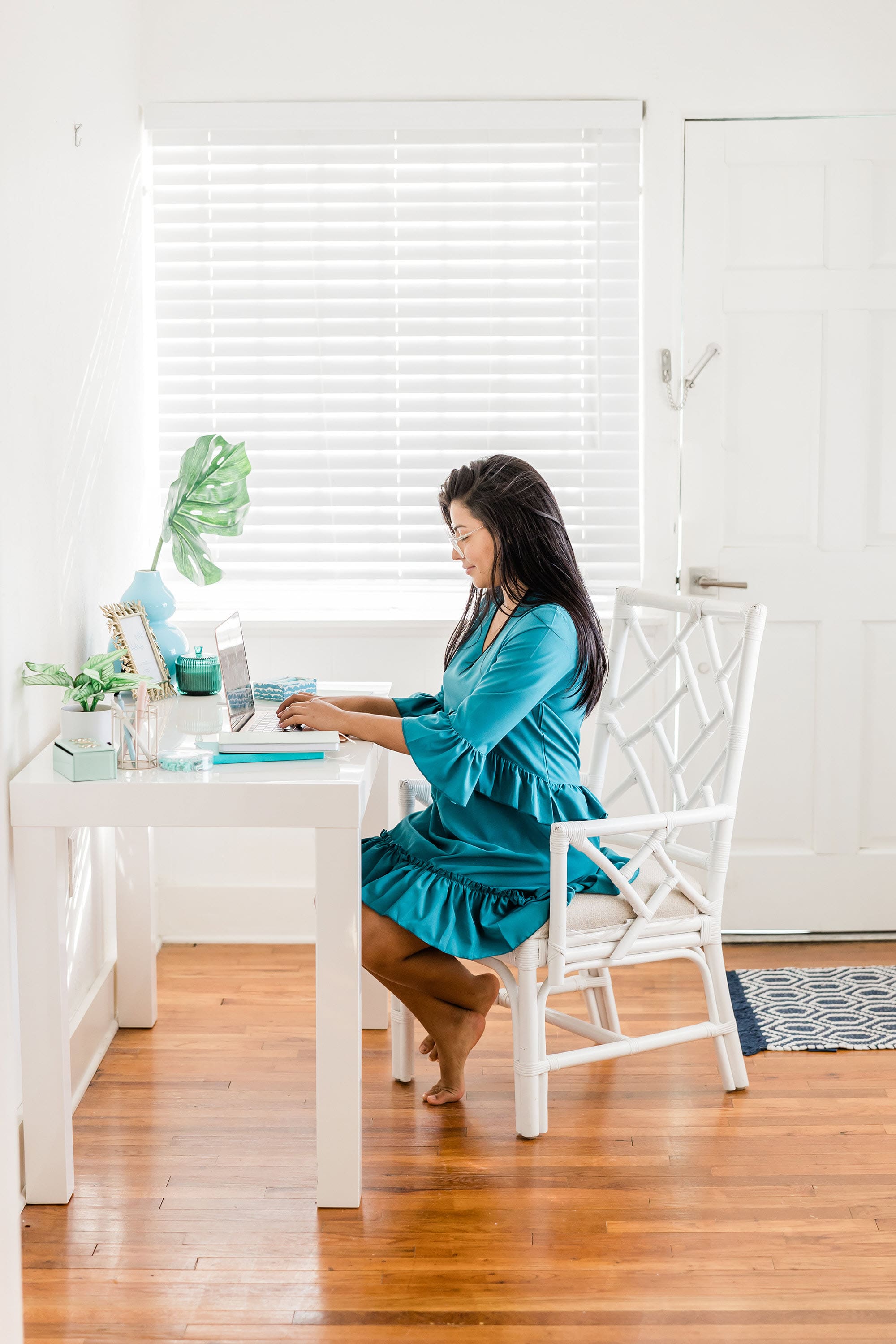 woman pretty office typing on laptop