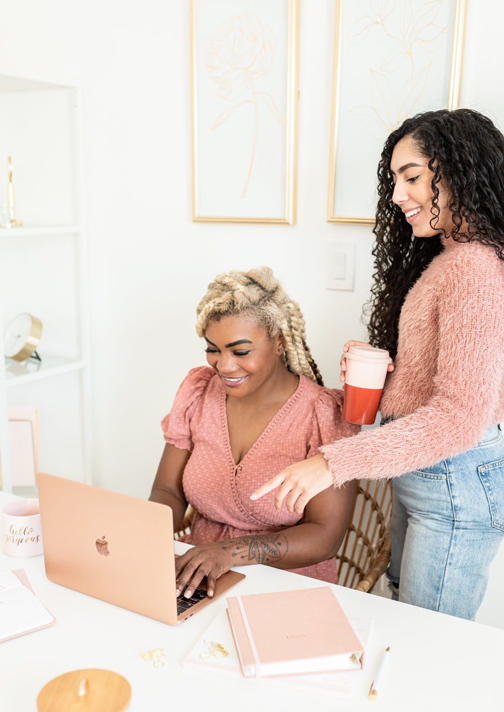 woman pink shirts working laptop